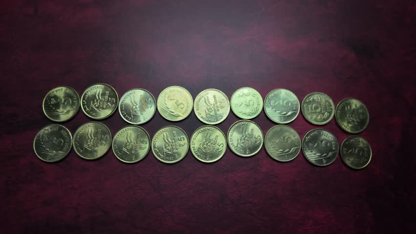 Indian Currency -  5 Rupee Coins - Panning  Shot. Royalty-Free Stock Footage #3444827395
