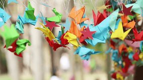 Origami paper bird spinning in wind Video