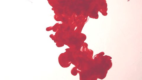 Red ink in water. Abstract
