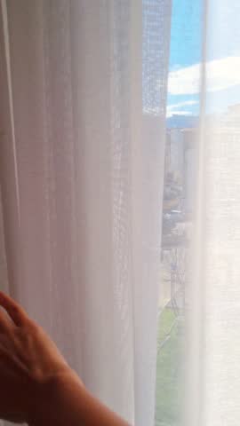 View behind curtain from Window