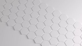 White hexagon honeycomb shapes matte surface moving randomly. Bright 3D animation of a seamless loop of hexagon beehive. Template for documents, reports and presentations. 4K motion graphic video