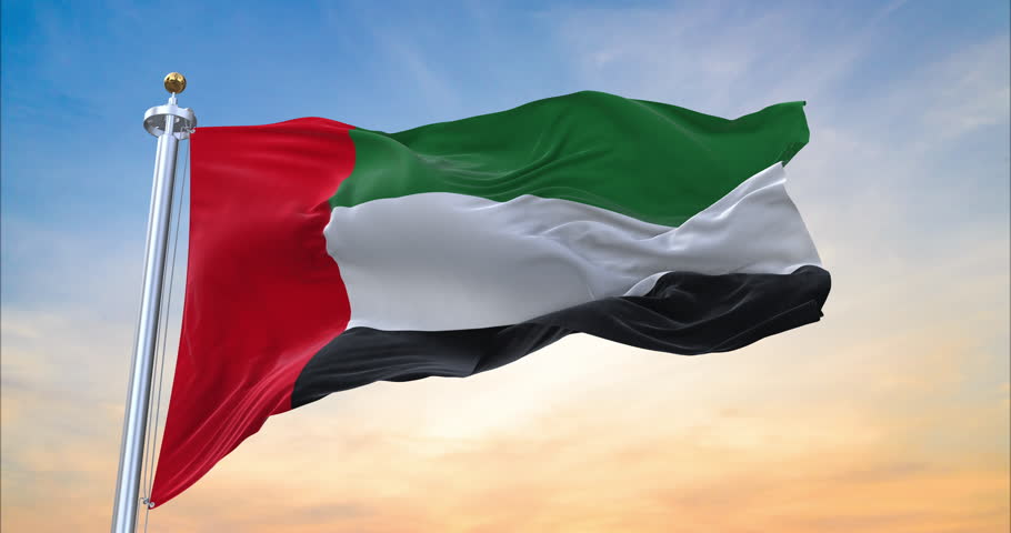Flag of United Arab Emirates realistic waving in the wind with sundown background (Perfect Loop) Royalty-Free Stock Footage #3445050199