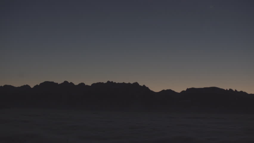 Rocky Mountains At Sunset. Silhouette