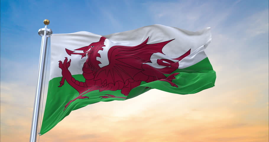Flag of Wales realistic waving in the wind with sundown background (Perfect Loop) Royalty-Free Stock Footage #3445070221