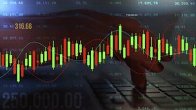 Candlestick chart and stock market investment concept on image of businessman typing on computer background - Powered by Shutterstock - Get 15% off with code: PIKWIZARD15