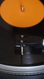 old vinyl record with clipping path. DJ Turntable with Vinyl Record, Playing, Top View. Close up at the needle on turntable. Vertical video for social media.