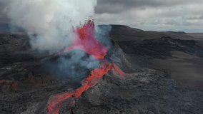 4K Drone aerial video of Iceland Volcanic eruption 2024. The volcano Fagradalsfjall is located in the valley Geldingadalir close to Grindavik and Reykjavik. Hot lava and magma coming out of the crater
