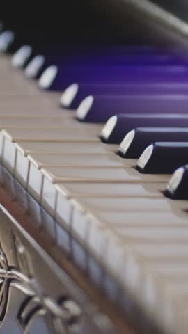 Panning through the keys of an antique upright piano. Royalty-Free Stock Footage #3445184693