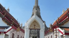 Entry gate to Wat Arun buddhist temple of dawn in Bangkok Thailand - Powered by Shutterstock - Get 15% off with code: PIKWIZARD15