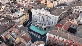 Trevi Fountain in Rome, Italy.
The monument most visited by tourists in Rome. Cinematic shooting with drone in 4K.