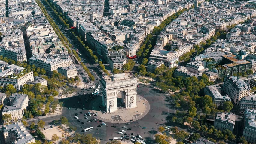 PARIS, FRANCE - MAY 30, 2023: Aerial view over Triumphal Arc traffic in central Paris cityscape. Famous touristic landmark, world heritage of architectural masterpieces. Royalty-Free Stock Footage #3445330457