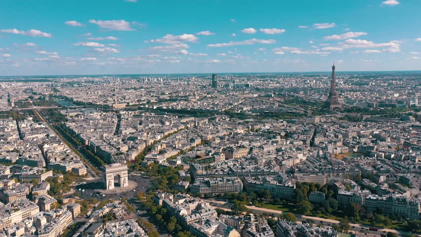 PARIS, FRANCE - MAY 30, 2023: Aerial view over Triumphal Arc traffic in central Paris cityscape. Famous touristic landmark, world heritage of architectural masterpieces. Royalty-Free Stock Footage #3445333871
