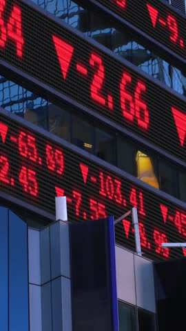 A vertical video of a down stock market ticker. Numbers are fictional and do not represent any particular stock.	 Royalty-Free Stock Footage #3445355415