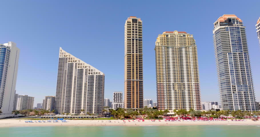 5k aerial stock video Sunny Isles Beach Florida view of highrise condos from the ocean side