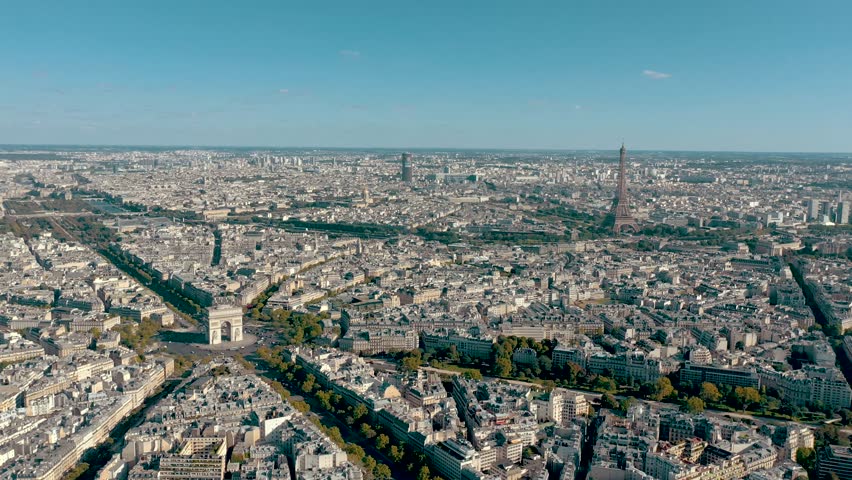 PARIS, FRANCE - MAY 30, 2023: Aerial view over Triumphal Arc traffic in central Paris cityscape. Famous touristic landmark, world heritage of architectural masterpieces. Royalty-Free Stock Footage #3445359477