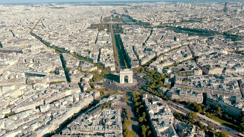 PARIS, FRANCE - MAY 30, 2023: Aerial view over Triumphal Arc traffic in central Paris cityscape. Famous touristic landmark, world heritage of architectural masterpieces. Royalty-Free Stock Footage #3445370593