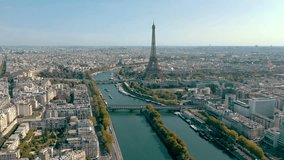 PARIS, FRANCE - MAY 30, 2023: Aerial view of Tour Eiffel Tower and Seine River bridge and historical city center. Famous touristic landmark, world heritage of architectural masterpieces - Powered by Shutterstock - Get 15% off with code: PIKWIZARD15