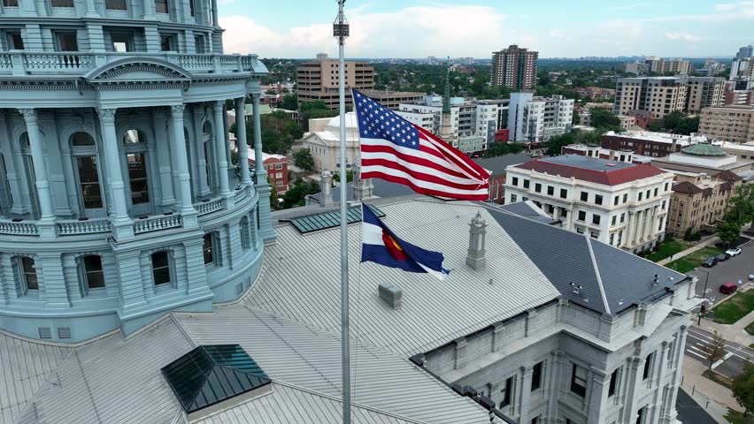 Drone Aerial Colorado State Capitol Building Flying Flags in Downtown Denver, Colorado 4K