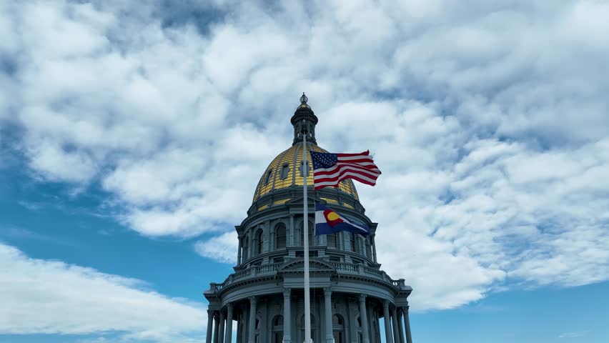Drone Aerial Colorado State Capitol Building Flying Flags in Downtown Denver, Colorado 4K Royalty-Free Stock Footage #3445407989