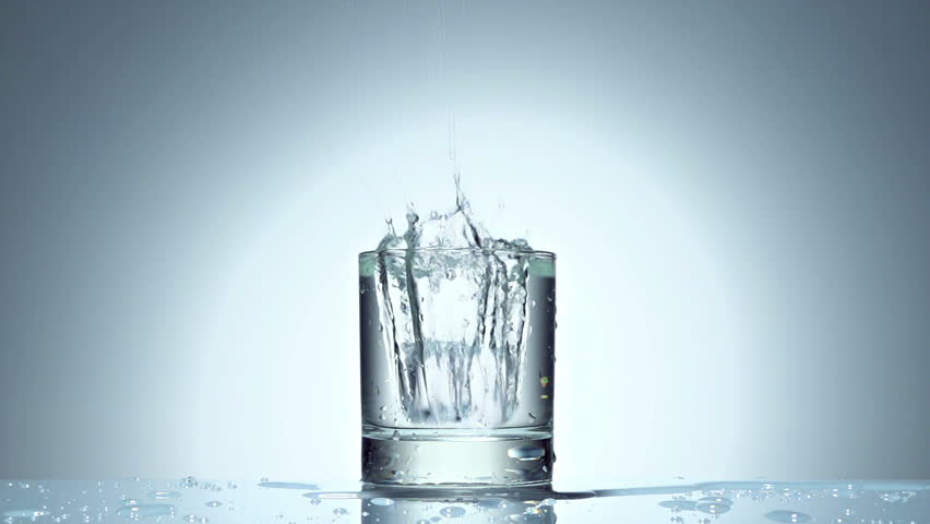 ice cube splash in glass of water on white, slow motion 250fps fullHD video