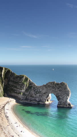 timelapse of Durdle Door beach in dorset, england in vertical format