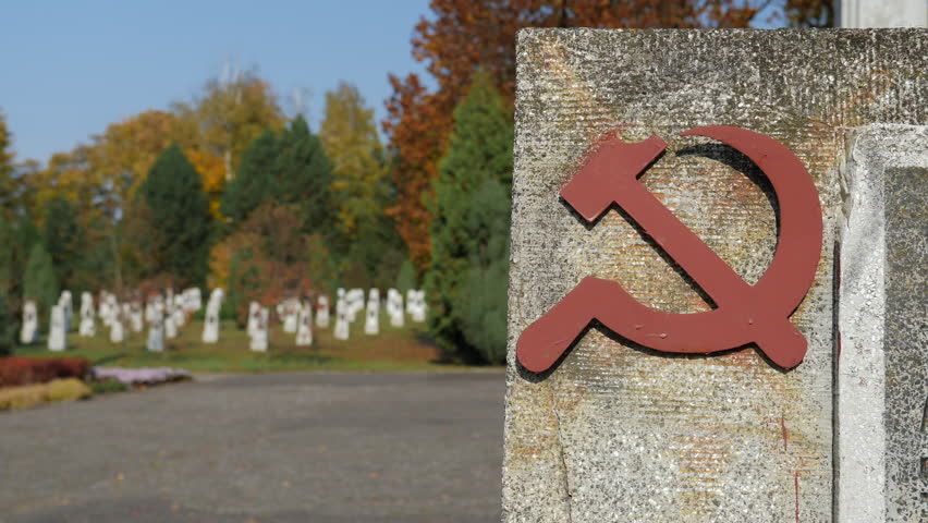 Soviet soldiers graveyard. Focus at sickle and hammer symbol Royalty-Free Stock Footage #3445467555