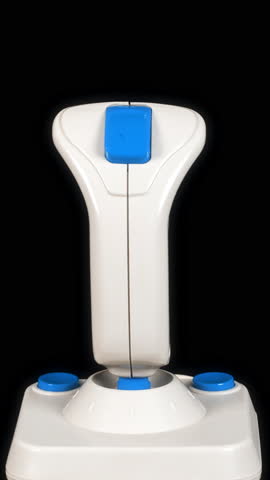 a retro computer arcade game joystick in vertical