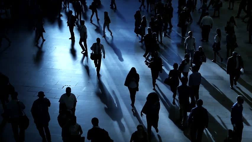 People Navigate the Day against the Bustling Streets