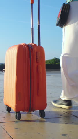 Young Woman with the Orange Suitcase on the travel. Female feet and luggage going on holiday and close up travel. Royalty-Free Stock Footage #3445832981