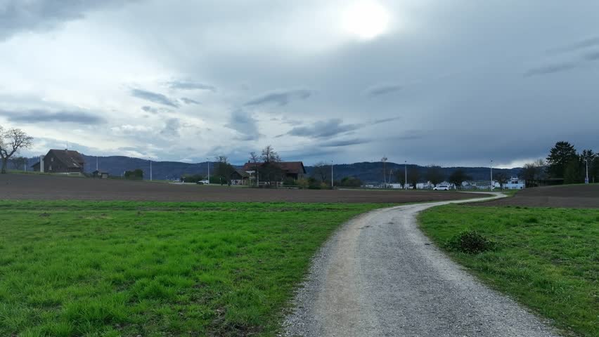 Aerial view seen from Hönggerberg over Swiss City of Zürich with local mountain Uetliberg and Limmat Valley in the background on a winter day. Movie shot February 24th, 2024, Zurich, Switzerland.