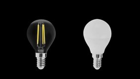 LED filament lightbulb and LED bulb with a diffused cover, lights up giving a clean light, isolated on black. Comparison of loft and modern style. Energy saving concept.  - Powered by Shutterstock - Get 15% off with code: PIKWIZARD15
