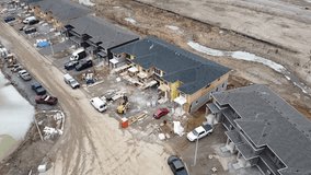 Aerial clip of sub division home construction