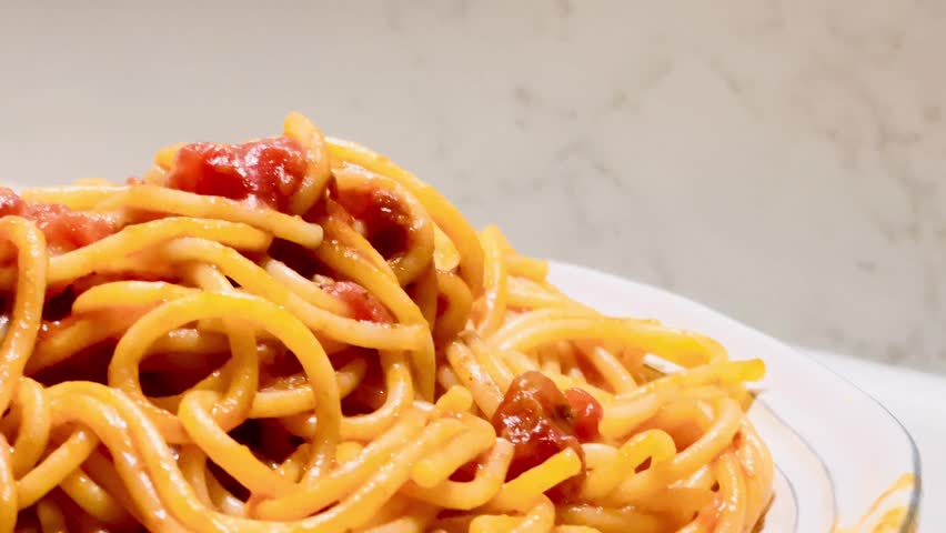 Classic spaghetti in tomato sauce, slow motion video Royalty-Free Stock Footage #3446033663
