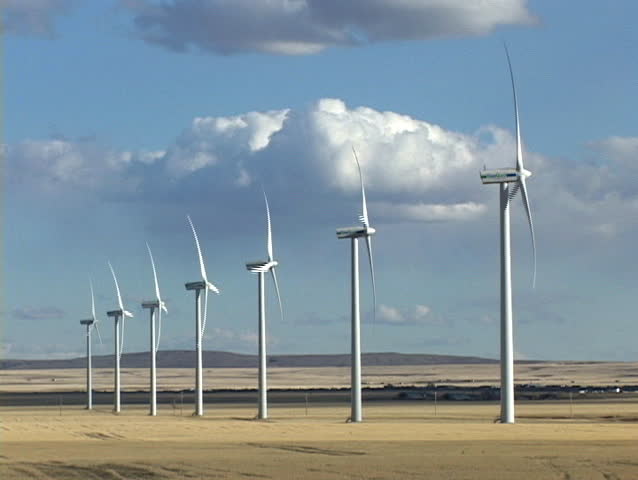 Row of seven wind turbines