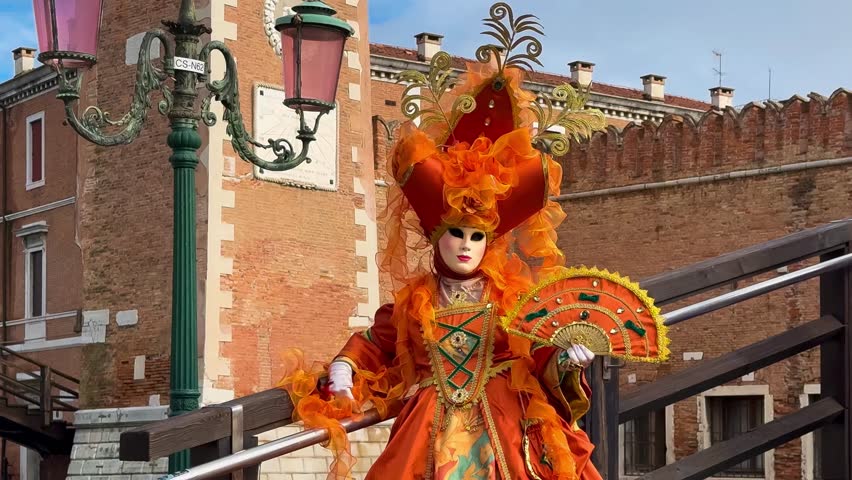 Venice Carnival. People in Venetian carnival masks and costumes on streets of Venice, Italy, Europe February 10, 2024. High quality 4k footage