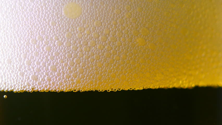 Full glass of beer bubbles close-up Royalty-Free Stock Footage #34461961