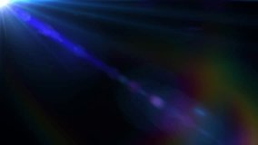 Loop top left blue optical lens flares shine rays light abstract on black background. 4K beautiful blue spotlight effects moving on top left. flash lights.Bright light lens flare - Powered by Shutterstock - Get 15% off with code: PIKWIZARD15