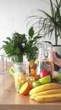 smoothie making process. Shaker with fruits for making fruit smoothies. Healthy eating concept. Healthy lifestyle in a child's life. Veganism, raw food and detox diet