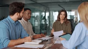 Happy middle aged business woman executive ceo leader discussing project management planning strategy working with diverse colleagues company team at office corporate board group meeting. - Powered by Shutterstock - Get 15% off with code: PIKWIZARD15