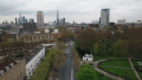 Aerial View Shot of London UK, United Kingdom, overcast, flying low