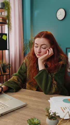 Sad frustrated pensive woman unrequited love suffers from unfair situation bankruptcy. Problem, break up depressed feeling bad annoyed burnout stress. Girl at home office table workplace. Vertical Royalty-Free Stock Footage #3446566807