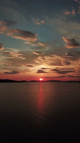 Aerial video over the Adriatic Sea at sunset in the Sibenik region in Croatia