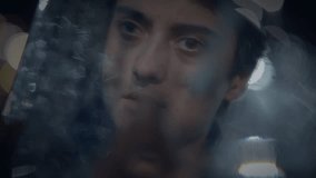 Thoughtful Male Person Looking Into Mirror Thinking and Self-reflecting - Powered by Shutterstock - Get 15% off with code: PIKWIZARD15