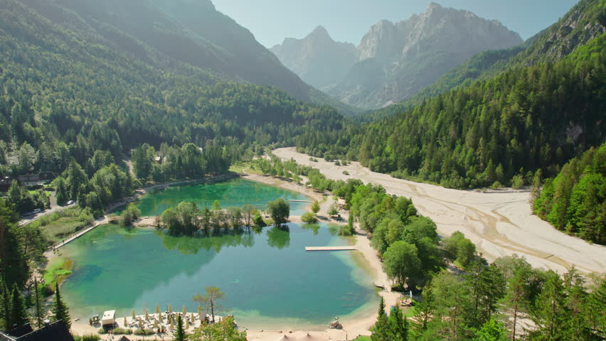 Aerial view of Jasna Lake in Kranjska Gora, Julian Alps, Slovenia. A beautiful mountain lake with emerald-colored water located in Triglav National Park