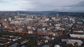 Establishing Aerial View Shot of Sheffield UK, South Yorkshire, England, United Kingdom , day, soft light, patchy clouds, overcast
