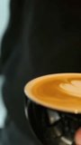 Close up hand barista makes coffes in coffee bar. Close-up Slow Motion of Grinder Stuffing Roasted Coffee from Coffee Machine. Filmed on High Speed Cinematic