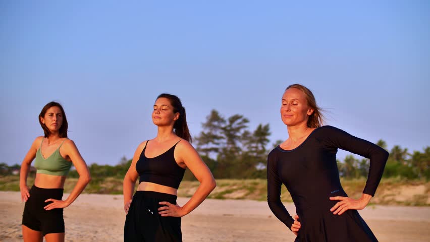 girls warming up on the beach