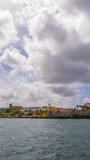 4K Vertical: Time lapse with moving Clouds in the Caribbean sky above Willemstad, Curacao