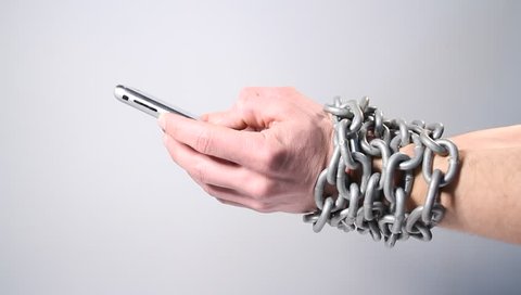  Nomophobia, chained hands with phone