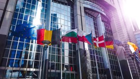 Flags of various European countries waving in front of Parliament building, Brussels 4K Slow Motion - Powered by Shutterstock - Get 15% off with code: PIKWIZARD15